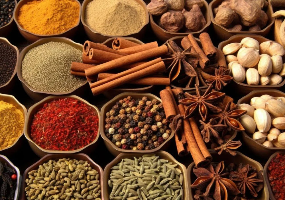 Assortment of premium Ceylon spices including cinnamon sticks, cardamom pods, and cloves, beautifully arranged to showcase their rich aroma and natural freshness.